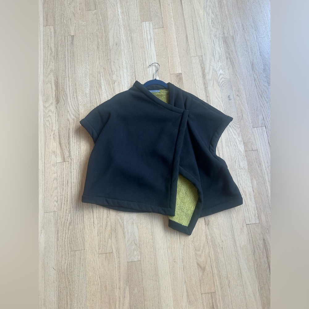Really short, somewhat a cardigan